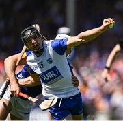 18 May 2025; Jamie Barron of Waterford is tackled by Craig Morgan of Tipperary during the Munster GAA Hurling Senior Championship Round 4 match between Tipperary and Waterford at FBD Semple Stadium in Thurles, Tipperary. Photo by Ray McManus/Sportsfile