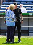 18 May 2025; Tipperary manager Liam Cahill talks to Tipperary based photographer Bridget Delaney before the Munster GAA Hurling Senior Championship Round 4 match between Tipperary and Waterford at FBD Semple Stadium in Thurles, Tipperary. Photo by Ray McManus/Sportsfile