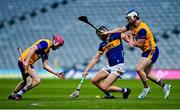 14 May 2025; Paddy McCormack of Tipperary in action against John Cahill, left, and Fiachra Ó Braoin of Clare during the oneills.com Munster GAA Hurling U20 Championship final match between Tipperary and Clare at TUS Gaelic Grounds in Limerick. Photo by Tyler Miller/Sportsfile