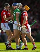 18 May 2025; Aaron Gillane of Limerick and Niall O'Leary of Cork, right, and Eoin Downey of Cork and Alan Connolly of Cork tusle during the Munster GAA Hurling Senior Championship Round 4 match between Limerick and Cork at TUS Gaelic Grounds in Limerick. Photo by Brendan Moran/Sportsfile