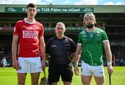 18 May 2025; Referee Liam Gordon with team captains Robert Downey of Cork, left, and Cian Lynch of Limerick before the Munster GAA Hurling Senior Championship Round 4 match between Limerick and Cork at TUS Gaelic Grounds in Limerick. Photo by Brendan Moran/Sportsfile