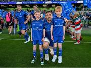17 May 2025; Leinster captain Jack Conan with mascots Harry Dunne and Luca Finn O'Neill before the United Rugby Championship match between Leinster and Glasgow Warriors at the Aviva Stadium in Dublin. Photo by Ramsey Cardy/Sportsfile