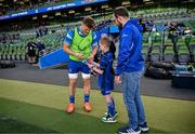 17 May 2025; Mascot Harry Dunne with Josh van der Flier before the United Rugby Championship match between Leinster and Glasgow Warriors at the Aviva Stadium in Dublin. Photo by Ramsey Cardy/Sportsfile