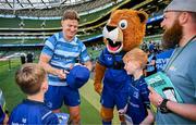 17 May 2025; Mascots Harry Dunne and Luca Finn O'Neill with Jordie Barrett before the United Rugby Championship match between Leinster and Glasgow Warriors at the Aviva Stadium in Dublin. Photo by Ramsey Cardy/Sportsfile