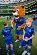 17 May 2025; Mascots Harry Dunne and Luca Finn O'Neill with Leo the Lion before the United Rugby Championship match between Leinster and Glasgow Warriors at the Aviva Stadium in Dublin. Photo by Ramsey Cardy/Sportsfile