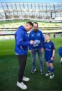 17 May 2025; Mascot Harry Dunne with Jordan Larmour before the United Rugby Championship match between Leinster and Glasgow Warriors at the Aviva Stadium in Dublin. Photo by Ramsey Cardy/Sportsfile