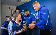 17 May 2025; Leinster players Garry Ringrose, right, and Rabah Slimani with supporters in Autograph Alley before the United Rugby Championship match between Leinster and Glasgow Warriors at the Aviva Stadium in Dublin. Photo by Sam Barnes/Sportsfile