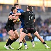 17 May 2025; Jimmy O'Brien of Leinster is tackled by, Huw Jones, left, and Sebastian Cancelliere of Glasgow Warriors during the United Rugby Championship match between Leinster and Glasgow Warriors at the Aviva Stadium in Dublin. Photo by Sam Barnes/Sportsfile
