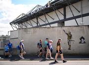18 May 2025; Supporters walk past a mural of Kilkenny hurlers TJ Reid and Liam 'Chunky' O'Brien before the Leinster GAA Hurling Senior Championship Round 4 match between Kilkenny and Dublin at UPMC Nowlan Park in Kilkenny. Photo by Ramsey Cardy/Sportsfile