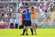 17 May 2025; Declan McCloskey of Antrim is shown the red card by Thomas Gleeson during the Leinster GAA Hurling Senior Championship Round 4 match between Galway and Antrim at Pearse Stadium in Galway. Photo by Piaras Ó Mídheach/Sportsfile