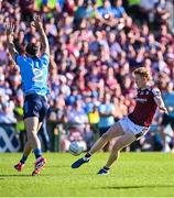 17 May 2025; Peter Cooke of Galway shoots under pressure from David Byrne of Dublin during the GAA Football All-Ireland Senior Championship Round 1 match between Galway and Dublin at Pearse Stadium in Galway. Photo by Piaras Ó Mídheach/Sportsfile