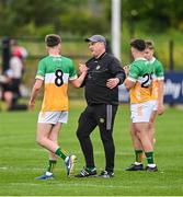 19 May 2025; Offaly manager Roger Ryan with Eamon Maher before the Electric Ireland Leinster GAA Football Minor Championship final match between Offaly and Louth at Cedral St Conleth's Park in Newbridge, Kildare. Photo by Piaras Ó Mídheach/Sportsfile