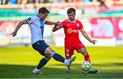 19 May 2025; James Norris of Shelbourne in action against Owen Lambe of Drogheda United during the SSE Airtricity Men's Premier Division match between Shelbourne and Drogheda United at Tolka Park in Dublin. Photo by Tyler Miller/Sportsfile