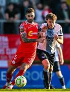 19 May 2025; Ellis Chapman of Shelbourne in action against Andrew Quinn of Drogheda United during the SSE Airtricity Men's Premier Division match between Shelbourne and Drogheda United at Tolka Park in Dublin. Photo by Sam Barnes/Sportsfile