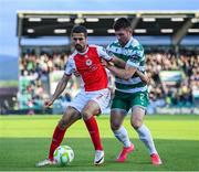 19 May 2025; Zach Elbouzedi of St Patrick's Athletic is tackled by Josh Honohan of Shamrock Rovers during the SSE Airtricity Men's Premier Division match between Shamrock Rovers and St Patrick's Athletic at Tallaght Stadium in Dublin. Photo by Stephen McCarthy/Sportsfile