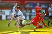 19 May 2025; Conor Kane of Drogheda United is fouled by Sean Gannon of Shelbourne during the SSE Airtricity Men's Premier Division match between Shelbourne and Drogheda United at Tolka Park in Dublin. Photo by Sam Barnes/Sportsfile