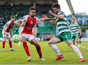 19 May 2025; Josh Honohan of Shamrock Rovers in action against Zach Elbouzedi of St Patrick's Athletic during the SSE Airtricity Men's Premier Division match between Shamrock Rovers and St Patrick's Athletic at Tallaght Stadium in Dublin. Photo by Thomas Flinkow/Sportsfile