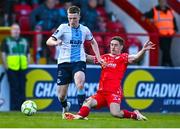 19 May 2025; Warren Davis of Drogheda United is tackled by John Martin of Shelbourne during the SSE Airtricity Men's Premier Division match between Shelbourne and Drogheda United at Tolka Park in Dublin. Photo by Tyler Miller/Sportsfile