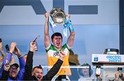 19 May 2025; Offaly captain Cian McNamee lifts the cup after his side's victory in the Electric Ireland Leinster GAA Football Minor Championship final match between Offaly and Louth at Cedral St Conleth's Park in Newbridge, Kildare. Photo by Piaras Ó Mídheach/Sportsfile