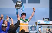 19 May 2025; Offaly captain Cian McNamee lifts the cup after his side's victory in the Electric Ireland Leinster GAA Football Minor Championship final match between Offaly and Louth at Cedral St Conleth's Park in Newbridge, Kildare. Photo by Piaras Ó Mídheach/Sportsfile