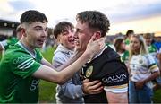 19 May 2025; Offaly goalkeeper Jack Ryan, right, celebrates with supporters after his side's victory in the Electric Ireland Leinster GAA Football Minor Championship final match between Offaly and Louth at Cedral St Conleth's Park in Newbridge, Kildare. Photo by Piaras Ó Mídheach/Sportsfile