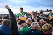 19 May 2025; Tomás Carroll of Offaly is held aloft by supporters after victory in the Electric Ireland Leinster GAA Football Minor Championship final match between Offaly and Louth at Cedral St Conleth's Park in Newbridge, Kildare. Photo by Piaras Ó Mídheach/Sportsfile