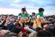 19 May 2025; Dermot Crombie of Offaly, 23, is held aloft by supporters after victory in the Electric Ireland Leinster GAA Football Minor Championship final match between Offaly and Louth at Cedral St Conleth's Park in Newbridge, Kildare. Photo by Piaras Ó Mídheach/Sportsfile