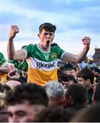 19 May 2025; Stephen Byrne of Offaly, 18, is held aloft by supporters after victory in the Electric Ireland Leinster GAA Football Minor Championship final match between Offaly and Louth at Cedral St Conleth's Park in Newbridge, Kildare. Photo by Piaras Ó Mídheach/Sportsfile