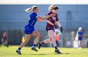 18 May 2025; Sarah Murphy of Westmeath in action against Ciara Burke of Laois during the TG4 Leinster LGFA Intermediate Championship final match between Laois and Westmeath at TEG Cusack Park in Mullingar, Westmeath. Photo by Seb Daly/Sportsfile