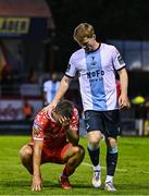 19 May 2025; John O'Sullivan of Shelbourne and Conor Kane of Drogheda United react at the final whistle during the SSE Airtricity Men's Premier Division match between Shelbourne and Drogheda United at Tolka Park in Dublin. Photo by Sam Barnes/Sportsfile
