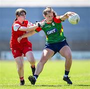 18 May 2025; Clíodhna Ní Shé of Carlow in action against Louise Byrne of Louth during the TG4 Leinster LGFA Junior Championship final match between Carlow and Louth at TEG Cusack Park in Mullingar, Westmeath. Photo by Seb Daly/Sportsfile