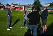 19 May 2025; Drogheda United manager Kevin Doherty is interviewed by Virgin Media Sport commentator David McIntyre before the SSE Airtricity Men's Premier Division match between Shelbourne and Drogheda United at Tolka Park in Dublin. Photo by Tyler Miller/Sportsfile