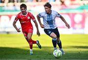 19 May 2025; Owen Lambe of Drogheda United in action against James Norris of Shelbourne during the SSE Airtricity Men's Premier Division match between Shelbourne and Drogheda United at Tolka Park in Dublin. Photo by Tyler Miller/Sportsfile