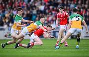 19 May 2025; Andrew O'Reilly of Louth is fouled by Charlie Duffy of Offaly during the Electric Ireland Leinster GAA Football Minor Championship final match between Offaly and Louth at Cedral St Conleth's Park in Newbridge, Kildare. Photo by Piaras Ó Mídheach/Sportsfile