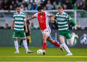 19 May 2025; Luke Turner of St Patrick's Athletic in action against Darragh Nugent of Shamrock Rovers during the SSE Airtricity Men's Premier Division match between Shamrock Rovers and St Patrick's Athletic at Tallaght Stadium in Dublin. Photo by Stephen McCarthy/Sportsfile