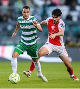 19 May 2025; Graham Burke of Shamrock Rovers in action against Luke Turner of St Patrick's Athletic during the SSE Airtricity Men's Premier Division match between Shamrock Rovers and St Patrick's Athletic at Tallaght Stadium in Dublin. Photo by Stephen McCarthy/Sportsfile