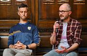 20 May 2025; Bohemians FC Pride Committee member Jim McIlroy, right, and Na Fianna GAA Head of Coaching Mark Cooper speaking at the launch of Bohemian Football Club Social Impact Report at the Mansion House in Dublin. Photo by Sam Barnes/Sportsfile