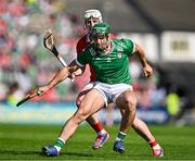 18 May 2025; Sean Finn of Limerick in action against Patrick Horgan of Cork during the Munster GAA Hurling Senior Championship Round 4 match between Limerick and Cork at TUS Gaelic Grounds in Limerick. Photo by Sam Barnes/Sportsfile