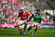 18 May 2025; Sean Finn of Limerick in action against Patrick Horgan of Cork during the Munster GAA Hurling Senior Championship Round 4 match between Limerick and Cork at TUS Gaelic Grounds in Limerick. Photo by Sam Barnes/Sportsfile