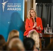 20 May 2025; Senator Evanne Ní Chuilinn in conversation with MC Sean O'Rourke during the Irish Sport Industry Awards 2025 at College Green Hotel in Dublin. Photo by David Fitzgerald/Sportsfile