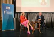 20 May 2025; Senator Evanne Ní Chuilinn in conversation with MC Sean O'Rourke during the Irish Sport Industry Awards 2025 at College Green Hotel in Dublin. Photo by David Fitzgerald/Sportsfile