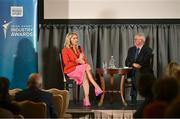 20 May 2025; Senator Evanne Ní Chuilinn in conversation with MC Sean O'Rourke during the Irish Sport Industry Awards 2025 at College Green Hotel in Dublin. Photo by David Fitzgerald/Sportsfile