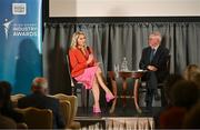 20 May 2025; Senator Evanne Ní Chuilinn in conversation with MC Sean O'Rourke during the Irish Sport Industry Awards 2025 at College Green Hotel in Dublin. Photo by David Fitzgerald/Sportsfile