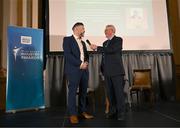 20 May 2025; Jimmy Magee’s grandson Christopher Mulvaney presenter of the Jimmy Magee Sports Media Coverage of the Year, in association with the ASJI award, in conversation with MC Sean O'Rourke during the Irish Sport Industry Awards 2025 at College Green Hotel in Dublin. Photo by David Fitzgerald/Sportsfile