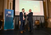 20 May 2025; Jimmy Magee’s grandson Christopher Mulvaney presenter of the Jimmy Magee Sports Media Coverage of the Year, in association with the ASJI award in conversation with MC Sean O'Rourke during the Irish Sport Industry Awards 2025 at College Green Hotel in Dublin. Photo by David Fitzgerald/Sportsfile