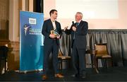 20 May 2025; Athletics Ireland Marketing and Communications Manager Darragh Brown, left, is presented with the Best Commerical Partnership in Sport award by Dublin City sport and wellbeing partnership manager Colin Sharkey during the Irish Sport Industry Awards 2025 at College Green Hotel in Dublin. Photo by David Fitzgerald/Sportsfile  Photo by David Fitzgerald/Sportsfile *** NO REPRODUCTION FEE ***