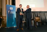 20 May 2025; Athletics Ireland Marketing and Communications Manager Darragh Brown, left, is presented with the Best Commerical Partnership in Sport award by Dublin City sport and wellbeing partnership manager Colin Sharkey during the Irish Sport Industry Awards 2025 at College Green Hotel in Dublin. Photo by David Fitzgerald/Sportsfile  Photo by David Fitzgerald/Sportsfile *** NO REPRODUCTION FEE ***