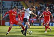 19 May 2025; Andrew Quinn of Drogheda United in action against Sean Gannon of Shelbourne during the SSE Airtricity Men's Premier Division match between Shelbourne and Drogheda United at Tolka Park in Dublin. Photo by Sam Barnes/Sportsfile