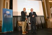 20 May 2025; Mayo Sports Partnerships Head Charlie Lambert in conversation with MC Sean O'Rourke after being presented with the Local Sports Partnership of the Year award during the Irish Sport Industry Awards 2025 at College Green Hotel in Dublin. Photo by David Fitzgerald/Sportsfile