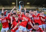 16 May 2025; Cork captain Bobby Carroll lifts The John Doyle Cup after his side's victory in the Electric Ireland GAA Hurling Munster Minor Championship final match between Cork and Waterford at FBD Semple Stadium in Thurles, Tipperary. Photo by Piaras Ó Mídheach/Sportsfile